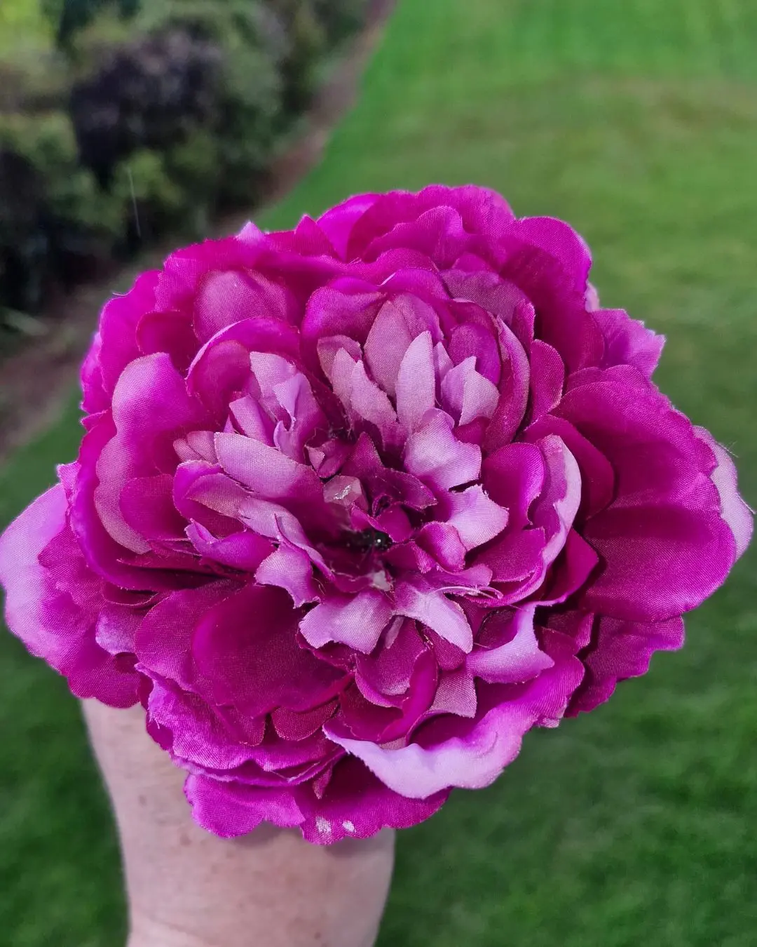 Seraphina magenta flower wand handcrafted by Glenda Goodspell the Good Witch for Sparkle & Spell Co. NZ, featuring a vibrant magenta bloom with Aura Rose Quartz center, made from sustainably gathered fallen tōtara branches