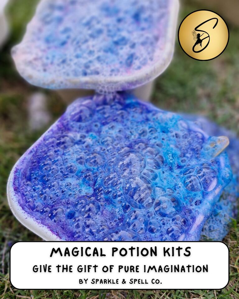 Fizzing, bubbling blue and purple magic potion play setup on grass, part of Sparkle & Spell Co.'s Magical Potion Kits collection for creative play.