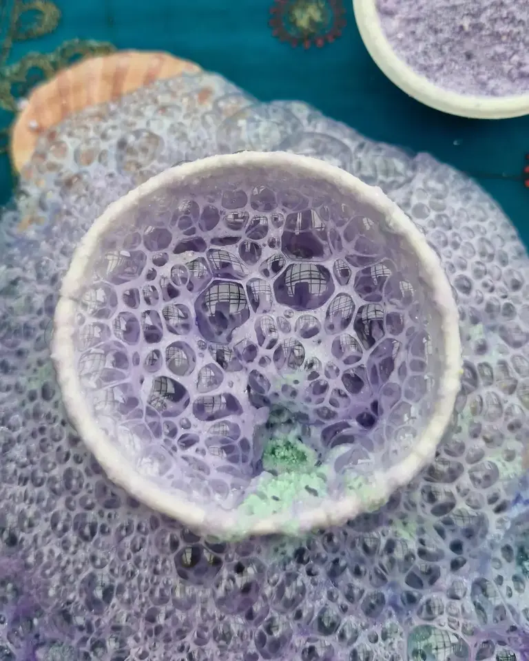 Fizzing purple magic potion bubbling to life in a compostable potion bowl — part of the Secrets of the Sea Magic Potion Kit for kids by Sparkle & Spell Co.