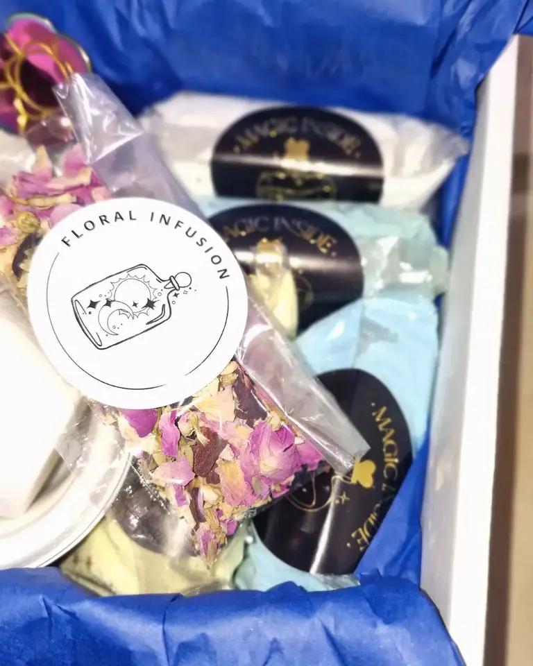 Floral infusion mix and potion powders from the Sorcerer’s Spellbook Magic Potion Kit by Sparkle & Spell Co., designed for creative potion play.