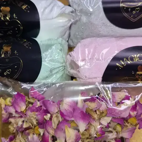 Inside the Sorcerer’s Spellbook Magic Potion Kit for Two — includes bowls, cups, floral infusion, potions, and magical spoons in eco-friendly packaging.